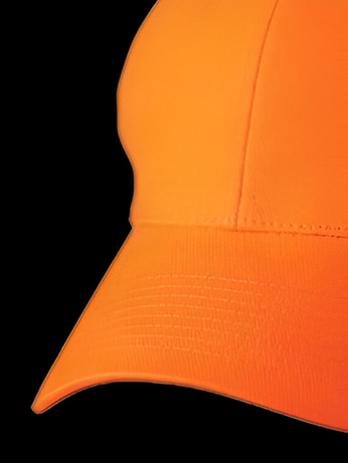 A close up of an orange baseball cap