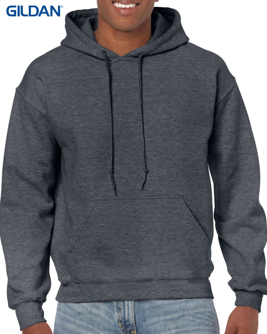 A man wearing a dark grey hoodie.