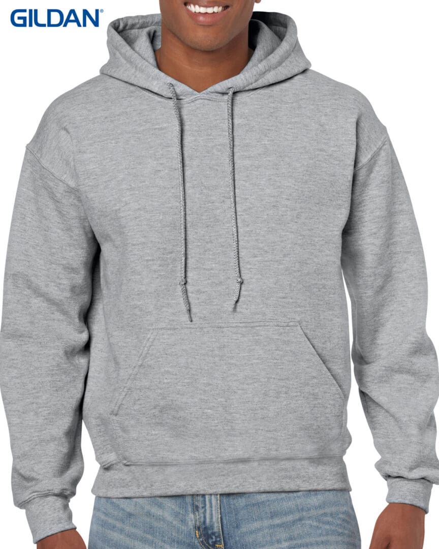 A man wearing a gray hoodie with a white background