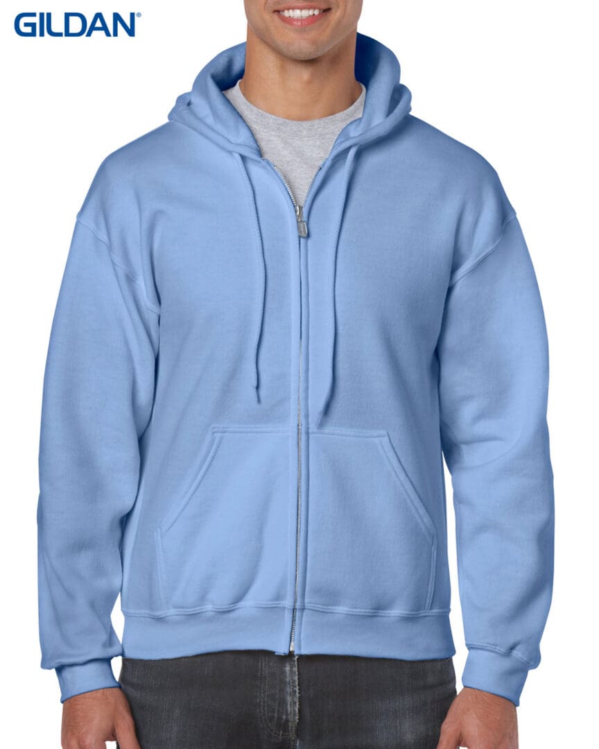 A man wearing a light blue hoodie.