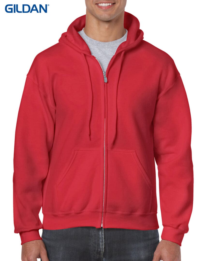 A man wearing a red hoodie with a white shirt