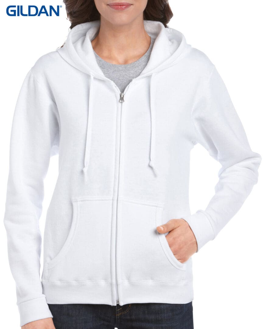 A woman wearing white hoodie and gray shirt.