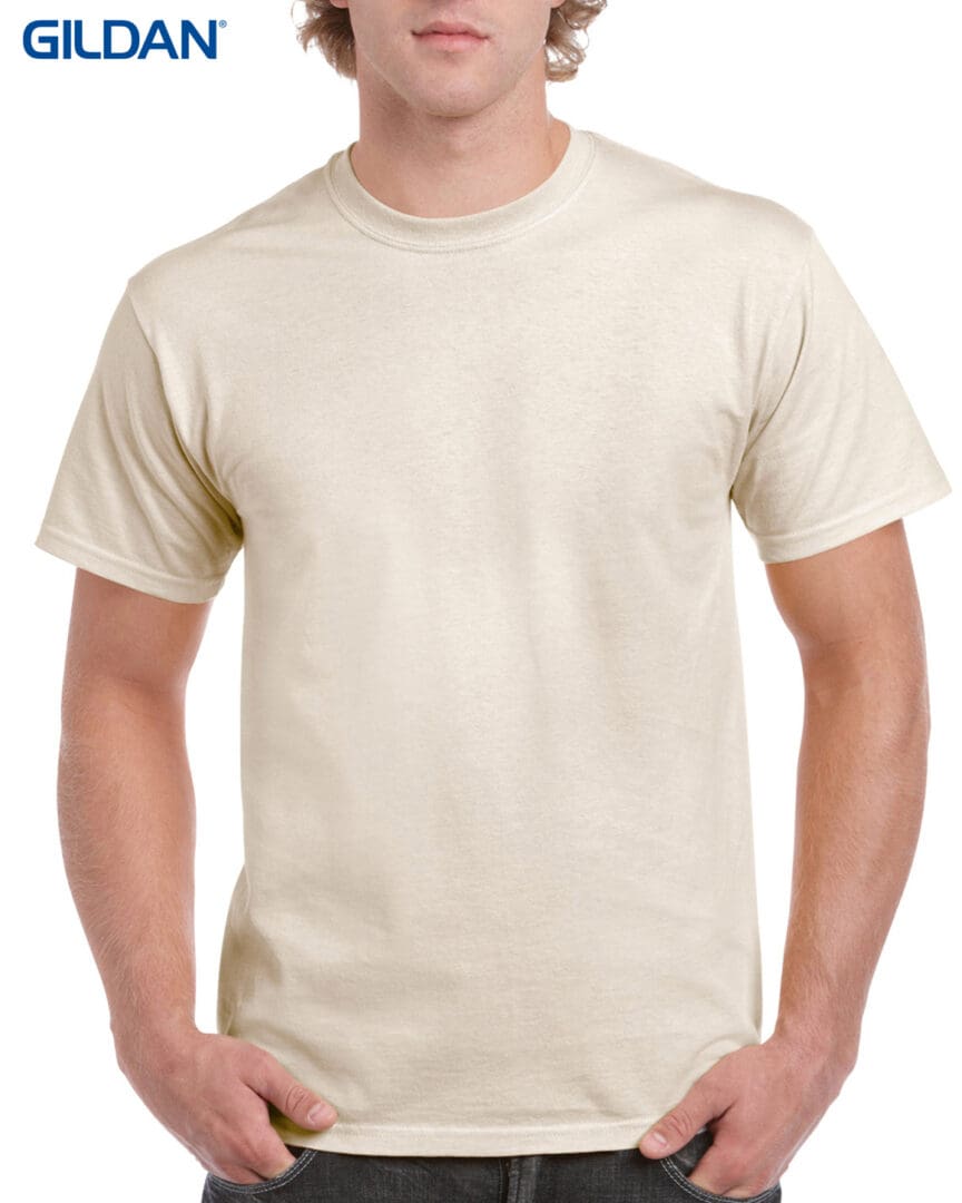 A man wearing a white t-shirt with no background.