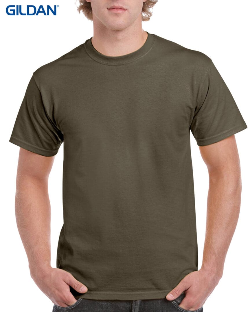 A man wearing a brown t-shirt with no background.