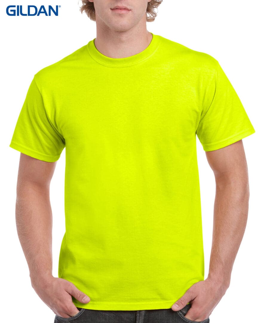 A man wearing neon green t-shirt with no background.