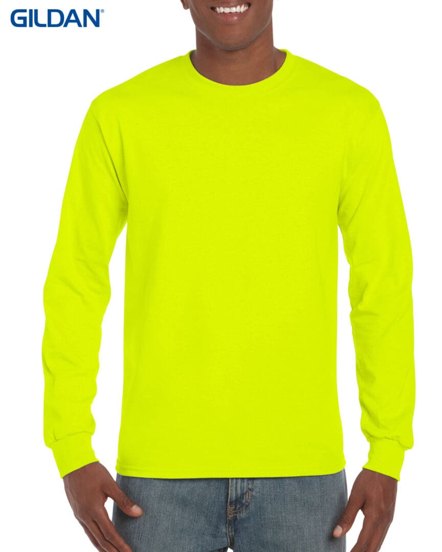 A man wearing a neon yellow long sleeve shirt.