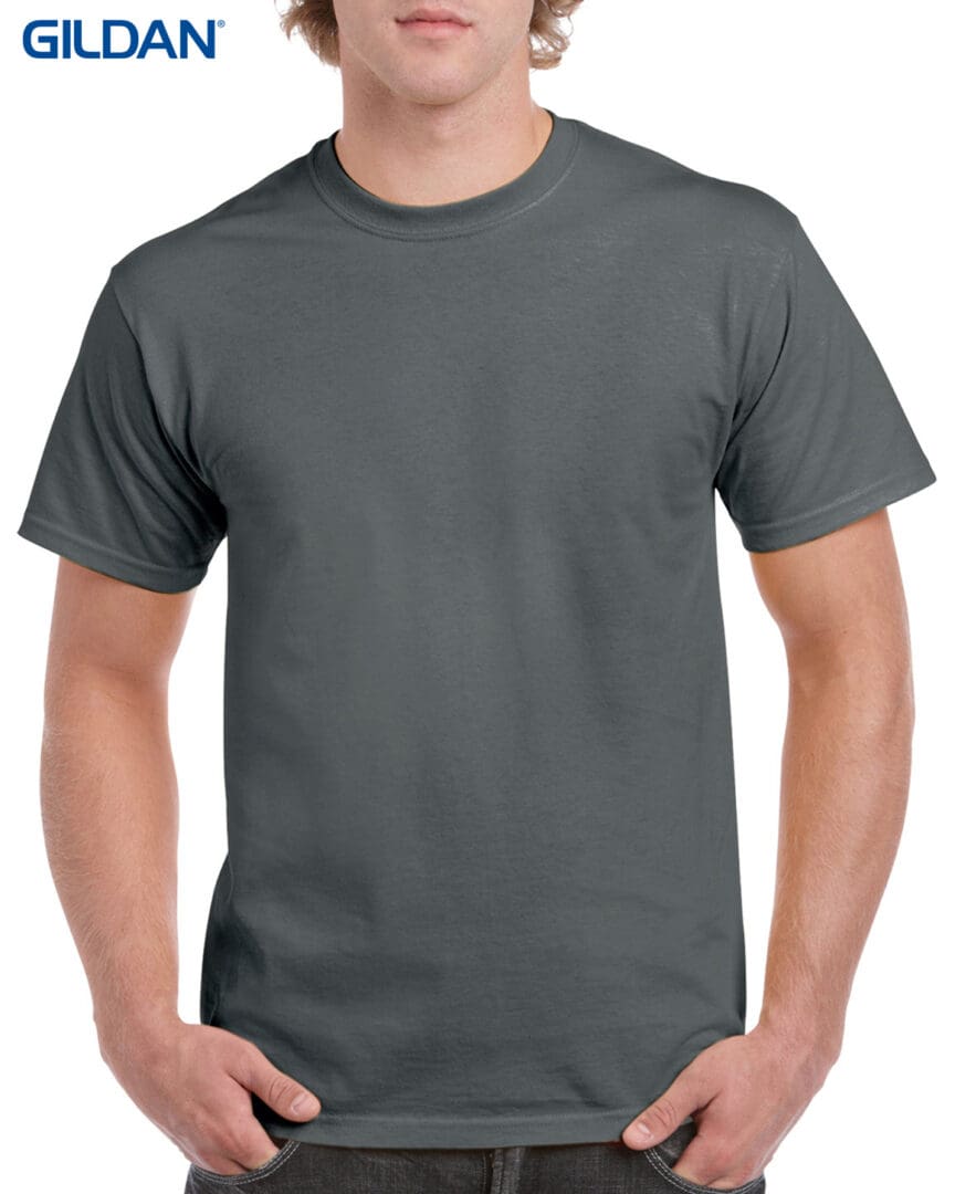 A man wearing a gray t-shirt with no background.