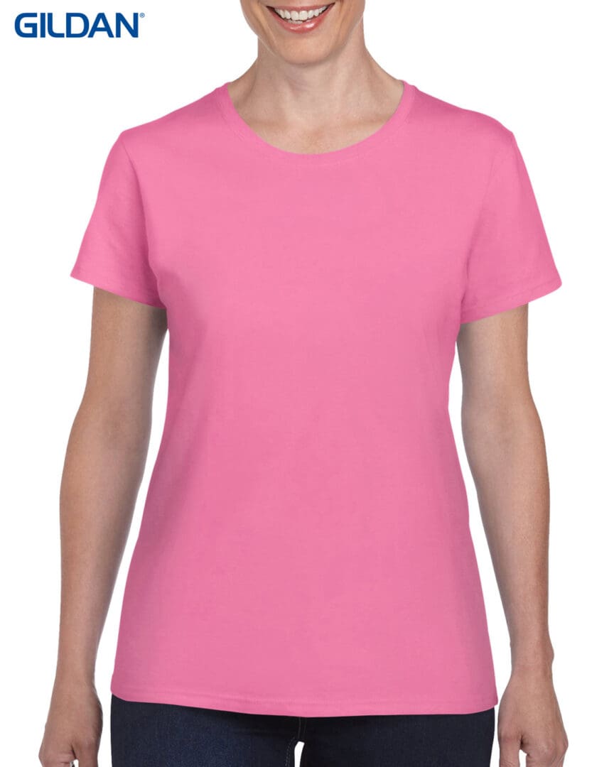 A woman wearing a pink t-shirt.