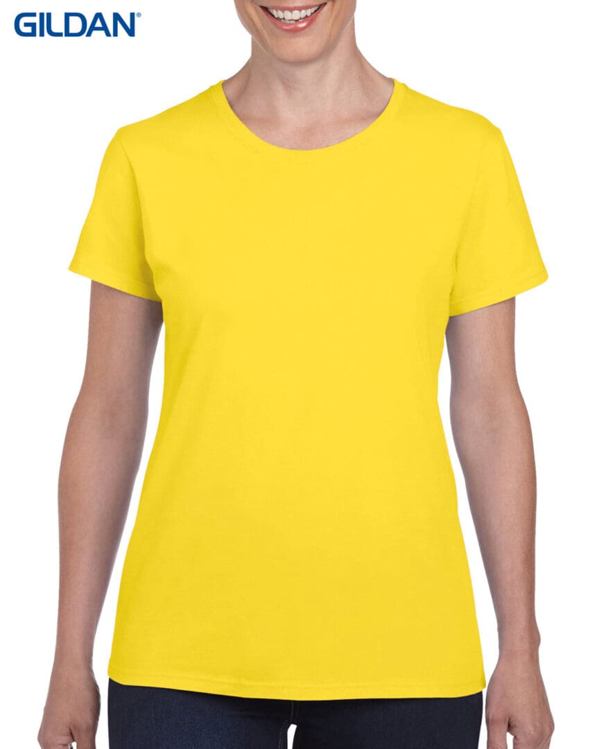 A woman wearing a yellow t-shirt.