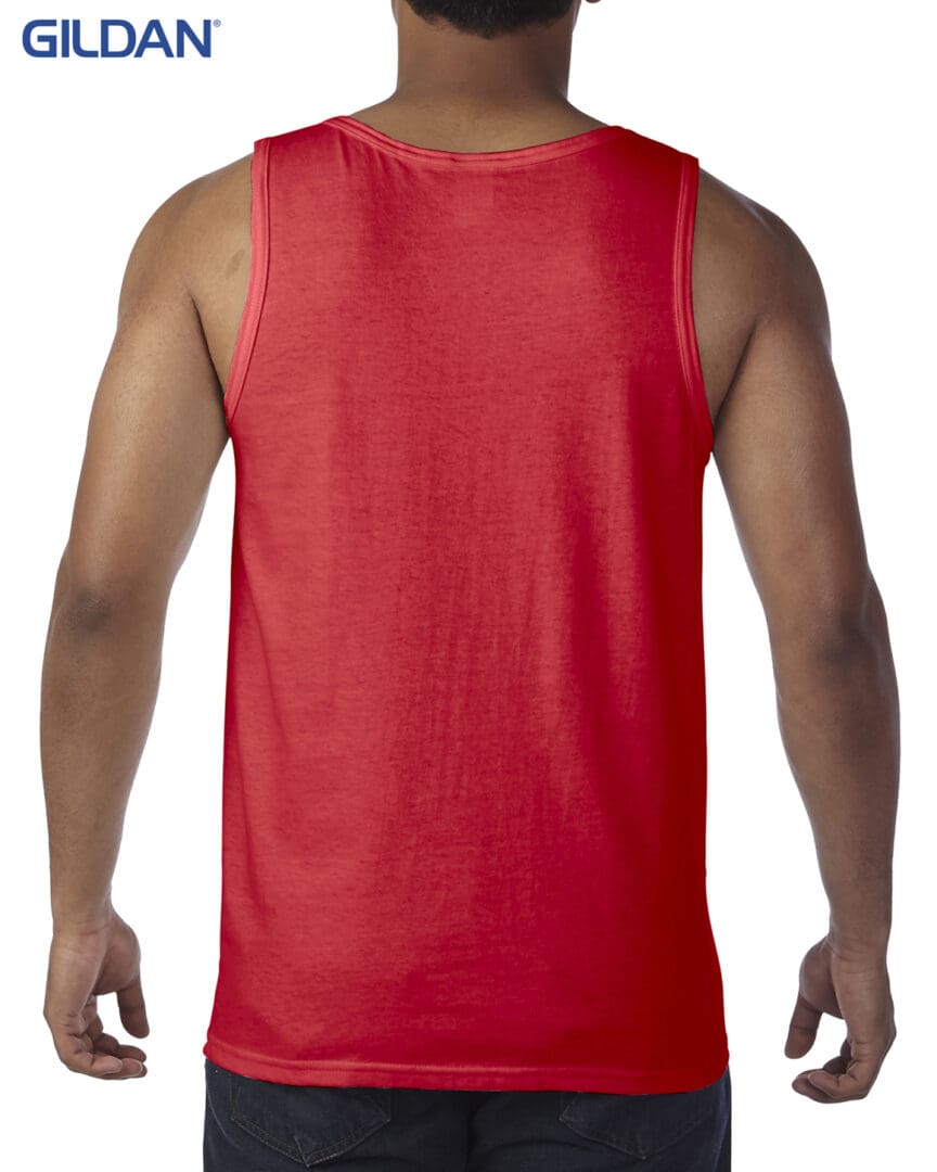 A man wearing a red tank top.