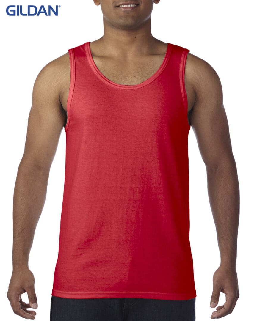 A man wearing a red tank top.