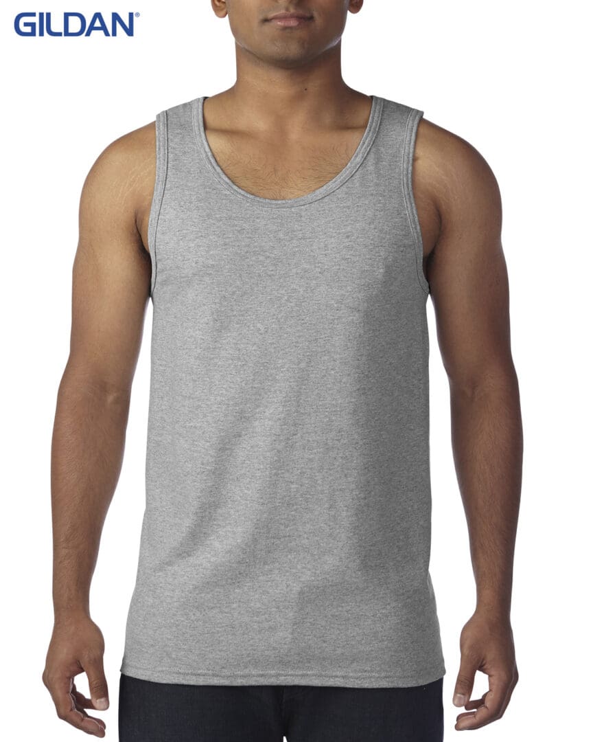 A man wearing a tank top with no sleeves.