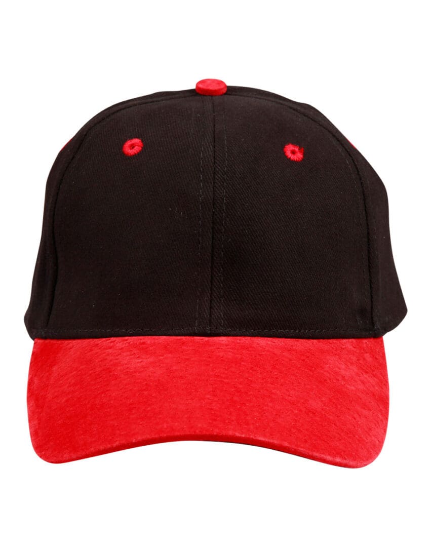 A black and red hat is on the ground