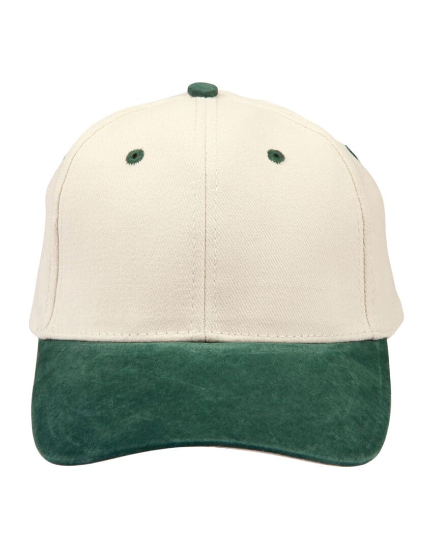 A white and green hat is on the ground