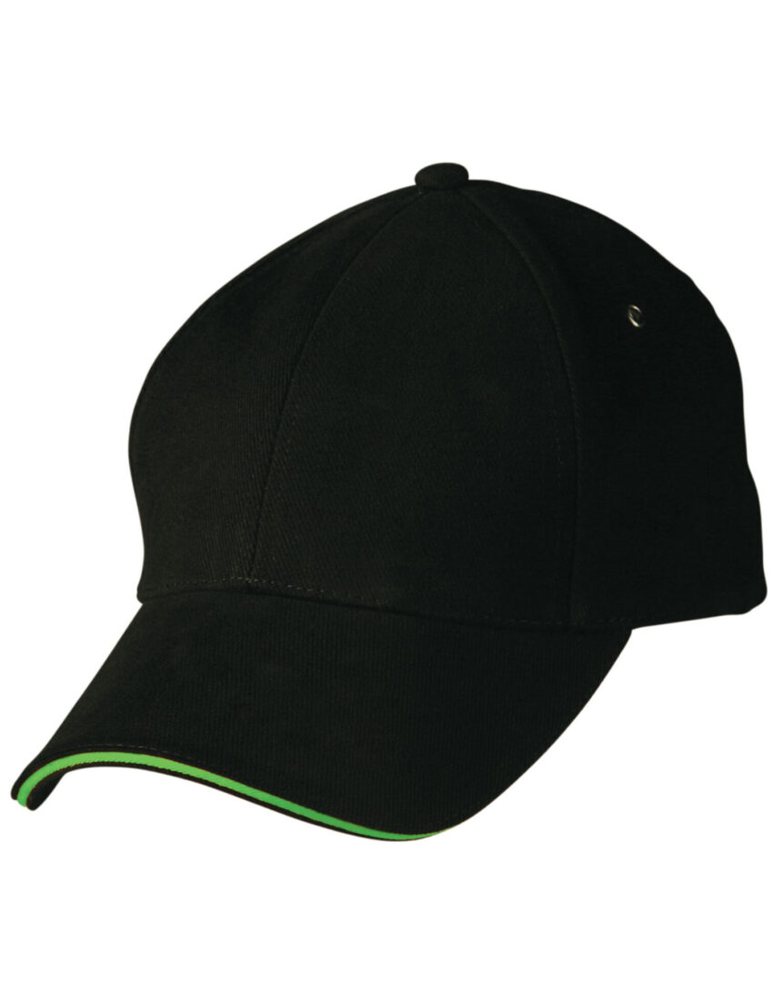 A black hat with green trim on top of it.