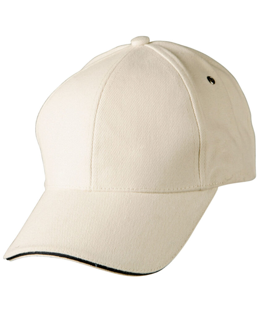 A white baseball cap with black trim on top of it.