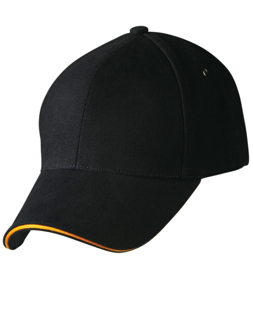 A black hat with yellow trim on top of it.